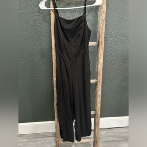 Woman’s black romper/jumpsuit